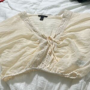 Cream crop top with puffy sleeves